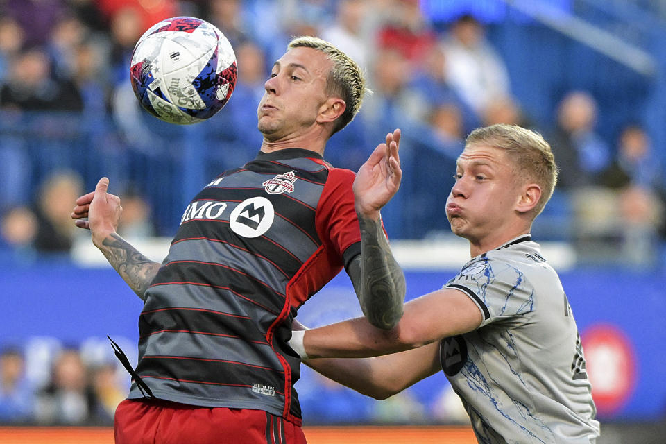 CF Montreal's Robert Thorkelsson, right, defends against Toronto FC's Federico Bernardeschi during the first half of an MLS soccer match Saturday, May 13, 2023, in Montreal. (Graham Hughes/The Canadian Press via AP)