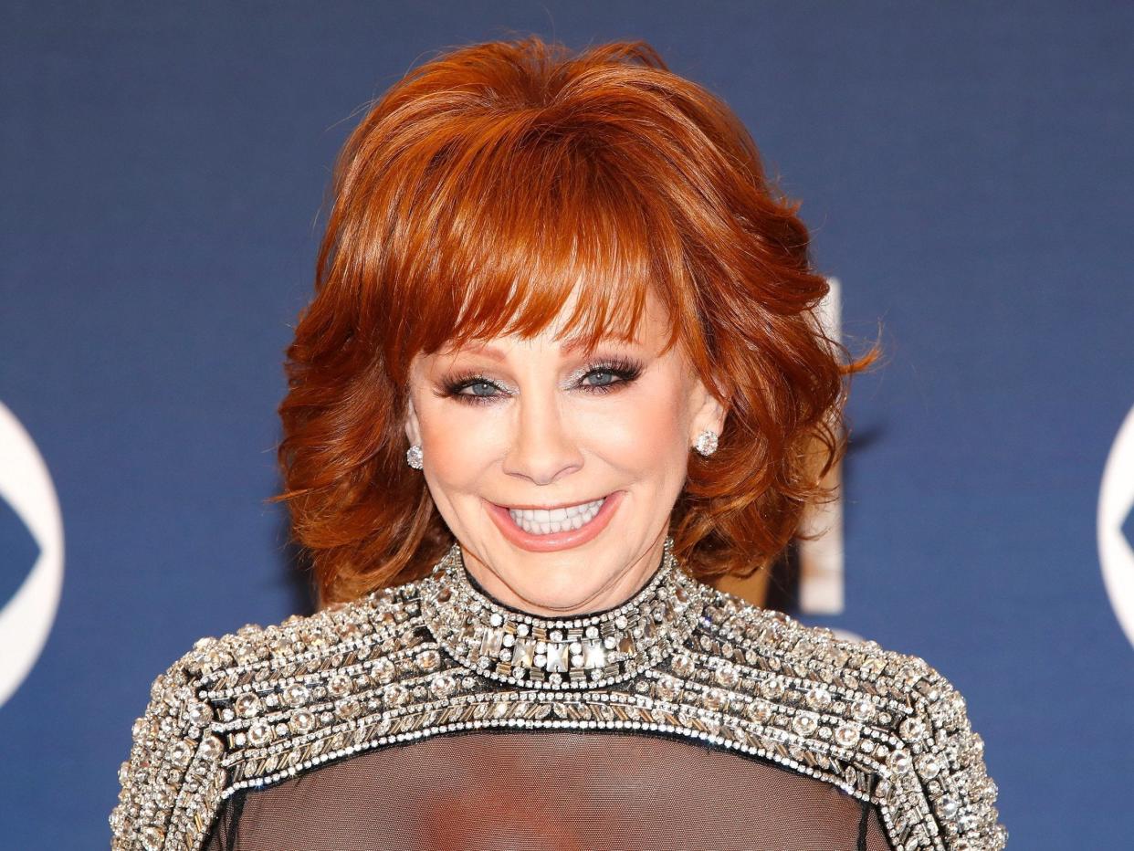 Reba McEntire has denied claims made by a poster that she will be attending and performing at a fundraiser for Republican governor Kristi Noem. (EPA)