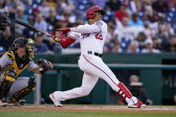 Washington Nationals' Juan Soto watches his single during the first inning of the team's baseball game against the Pittsburgh Pirates at Nationals Park, Tuesday, June 28, 2022, in Washington. (AP Photo/Alex Brandon)