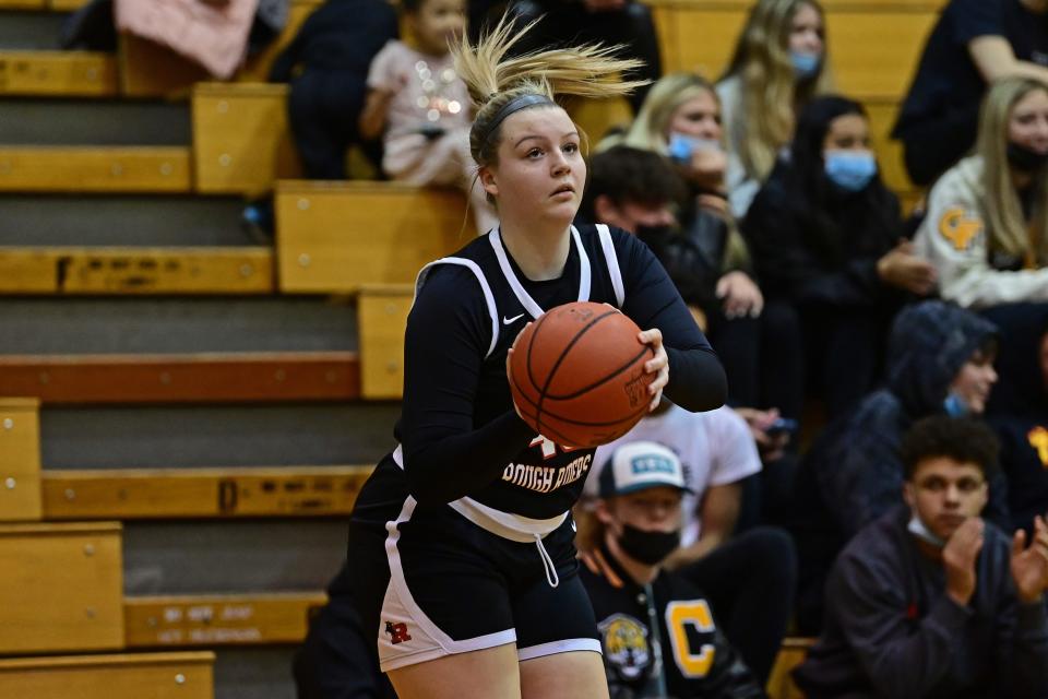 Roosevelt's Lexie Canning shoots a three-point shot during the first half of their game against Cuyahoga Falls Wednesday night at Cuyahoga Falls High School.
