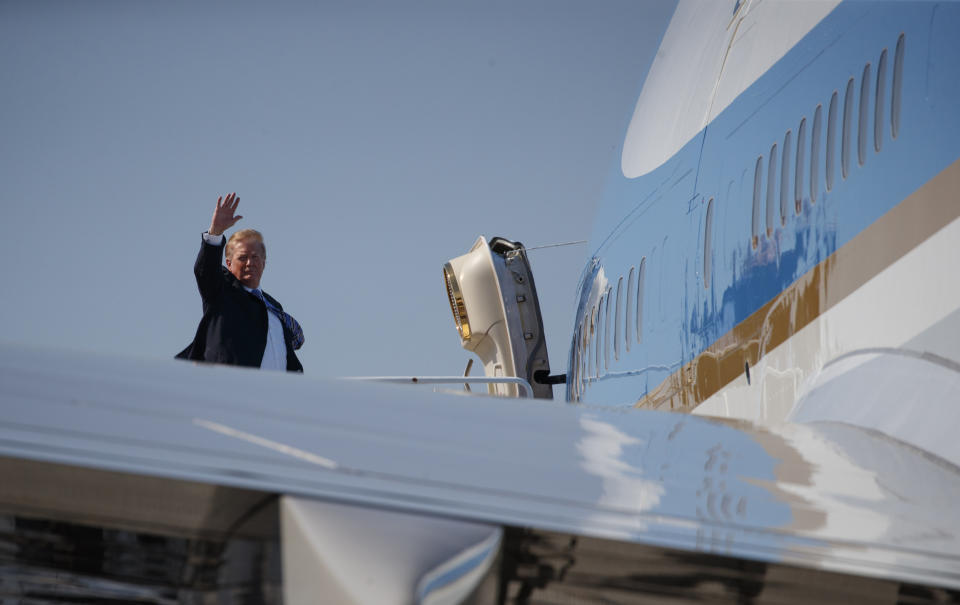 President Donald Trump boards Air Force One at Palm Beach International Airport, in West Palm Beach, Fla., Sunday, March 10, 2019, en route to Washington. (AP Photo/Carolyn Kaster)