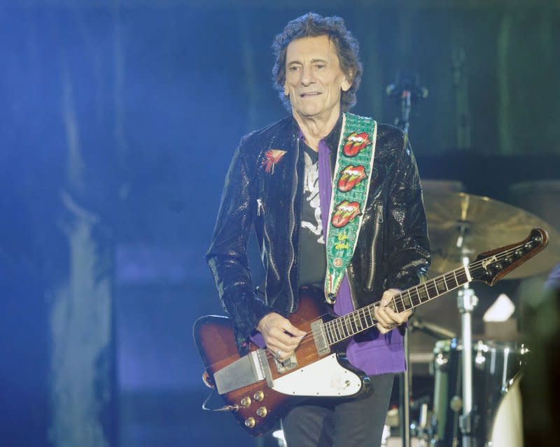 Rolling Stones guitarist Ronnie Wood entertains the fans during the opening set of their No Filter Tour Concert at the Dome At America's Center in St. Louis on September 26, 2021. The rocker turns 77 on June 1. File Photo by Bill Greenblatt/UPI