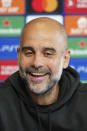 Manchester City's head coach Pep Guardiola smiles as he speaks during a press conference at a UEFA Champions League Media Day before the forthcoming Champion's League final, Manchester, England, Tuesday, June 6, 2023. Manchester City will play Inter Milan in the final of the Champion's League on Saturday June 10 in Istanbul. (AP Photo/Jon Super)