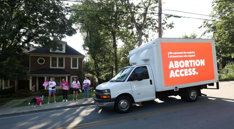 Planned Parenthood demonstrators protest the recent attempts to restrict abortion outside the home of Sen. Mitch McConnell in Louisville, Ky. on Sep. 1 2021.  