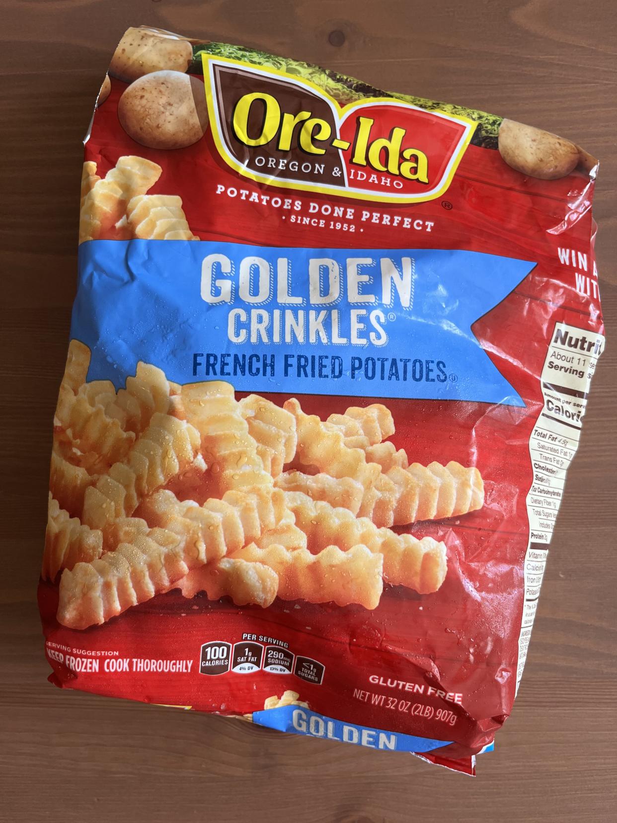 a bag of ore-ida golden crinkles frozen french fries