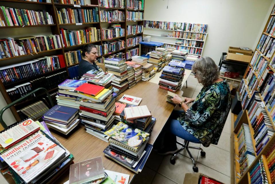 From left: Friends of the Ector County Library volunteers Donna Caldwell and Judy Snowden sort through donated books that will be either sold or given away. Books sold help to bring revenue to the library's various programs. The books sell for 50 cents per paperback, one dollar per hard back, or five dollars for a bag of books.