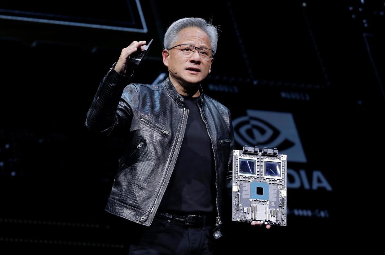 <span>Jensen Huang speaks at the Computex 2024 exhibition in Taipei, Taiwan, on 2 June 2024.</span><span>Photograph: Chiang Ying-ying/AP</span>