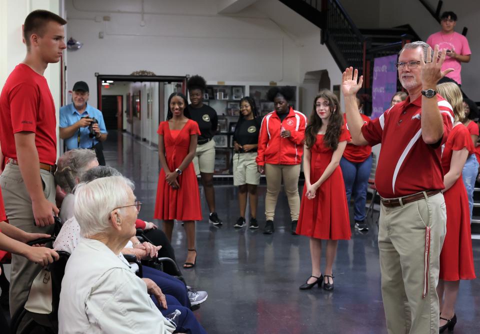 Leon High School principal Michael Bryan speaks to current students and alumni at a reunion for the class of 1951 Saturday, Sept. 17, 2022.