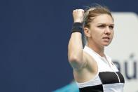 Mar 24, 2019; Miami Gardens, FL, USA; Simona Halep of Romania reacts after winning a point against Polona Hercog of Slovenia (not pictured) in the third round of the Miami Open at Miami Open Tennis Complex. Mandatory Credit: Geoff Burke-USA TODAY Sports