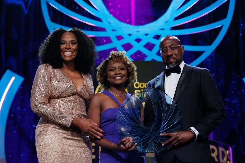 WASHINGTON, DC – SEPTEMBER 23: (L-R) Stacey Plaskett, Karine Jean-Pierre and Senator Raphael Warnock pose onstage at the Congressional Black Caucus Foundation Annual Legislative Conference Phoenix Awards on September 23, 2023 in Washington, DC. (Photo by Jemal Countess/Getty Images for Congressional Black Caucus Annual Legislative Conference)