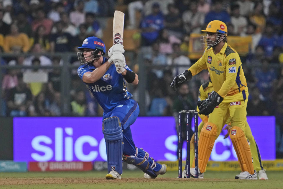 Mumbai Indians' Tim David bats during the Indian Premier League (IPL) cricket match between Mumbai Indians and Chennai Super Kings in Mumbai, India, Saturday, April 8, 2023. (AP Photo/Rajanish Kakade)