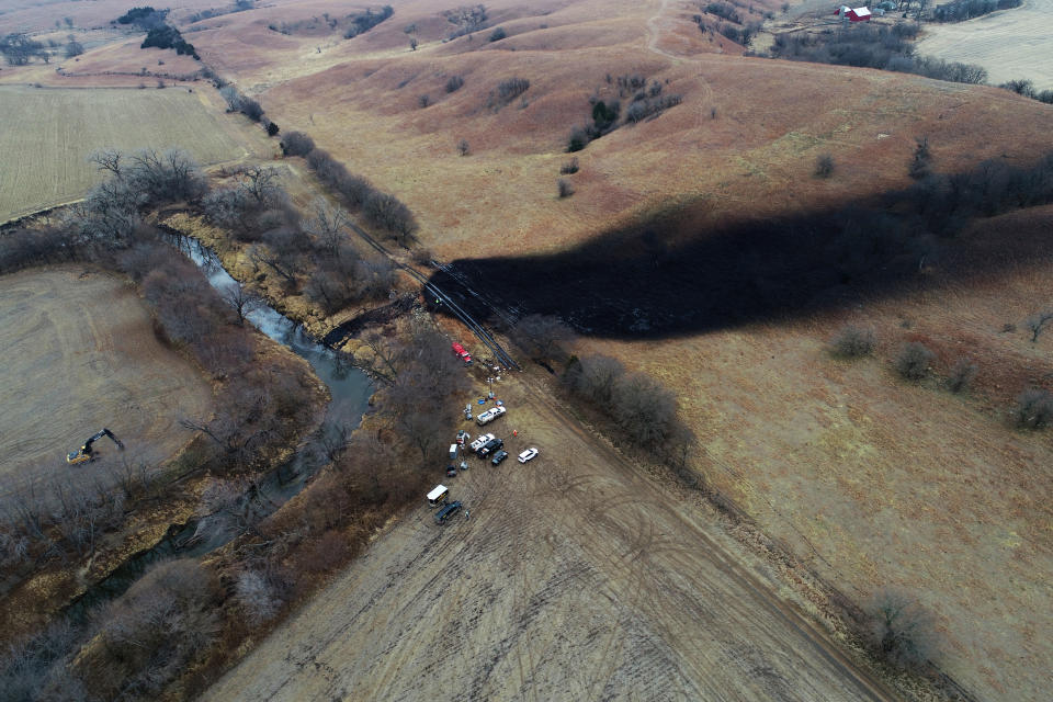 FILE - In this photo taken with a drone, cleanup continues in the area where the ruptured Keystone pipeline dumped oil into a creek in Washington County, Kan., Dec. 9, 2022. TC Energy, the operator of the Keystone pipline system, has finished cleaning up a massive December 2022 oil spill, and the creek affected by it is flowing naturally again, the company and the U.S. Environmental Protection Agency announced Tuesday, Oct. 31, 2023. (Zeitview via AP, File)