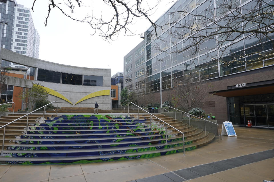 An Amazon headquarters building is shown on the company's corporate campus in downtown Seattle, Tuesday, Dec. 7, 2021. Amazon Web Services suffered a major outage Tuesday, the company said, disrupting access to many popular sites. The company provides cloud computing services to many governments, universities and companies, including The Associated Press. (AP Photo/Ted S. Warren)