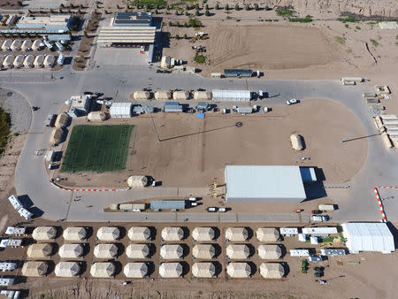 A tent city set up to hold immigrant children separated from their parents or who crossed the U.S. border on their own is seen in Tornillo, Texas, U.S., in this U.S. Department of Health and Human Services (HHS) image released on October 12, 2018. Courtesy HHS/Handout via REUTERS