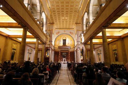 People attend a mass in Saint George Maronite Cathedral during the inauguration of its bell tower in downtown Beirut, Lebanon November 19, 2016. REUTERS/Mohamed Azakir