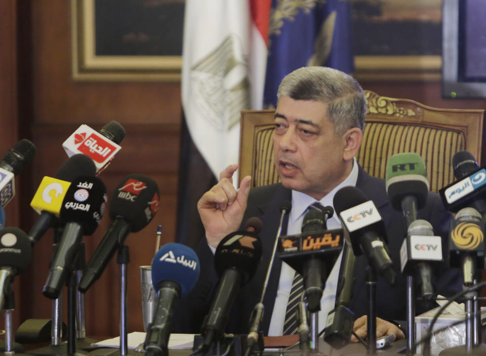 Egypt's Interior Minister Mohammed Ibrahim, speaks during a press conference at the interior ministry headquarters in Cairo, Egypt, Monday, May 12, 2014. Egypt's top security official has sought to build claims that the Muslim Brotherhood is backing terrorism, showing alleged confessions of militants saying the received funds from members of the group to attack police and the military. (AP Photo/Amr Nabil)