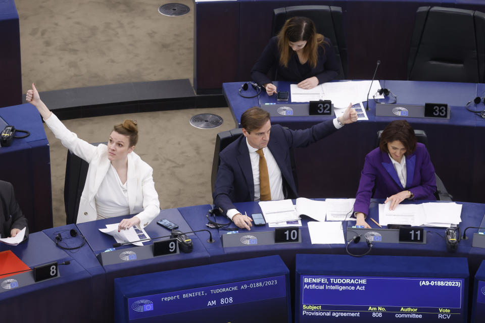 European Union lawmakers vote on an Artificial Intelligence Act at the European Parliament, Wednesday, March 13, 2024 in Strasbourg, eastern France. European Union lawmakers are set to give final approval to the 27-nation bloc's artificial intelligence law, putting the world-leading rules on track to take effect later this year. (AP Photo/Jean-Francois Badias)