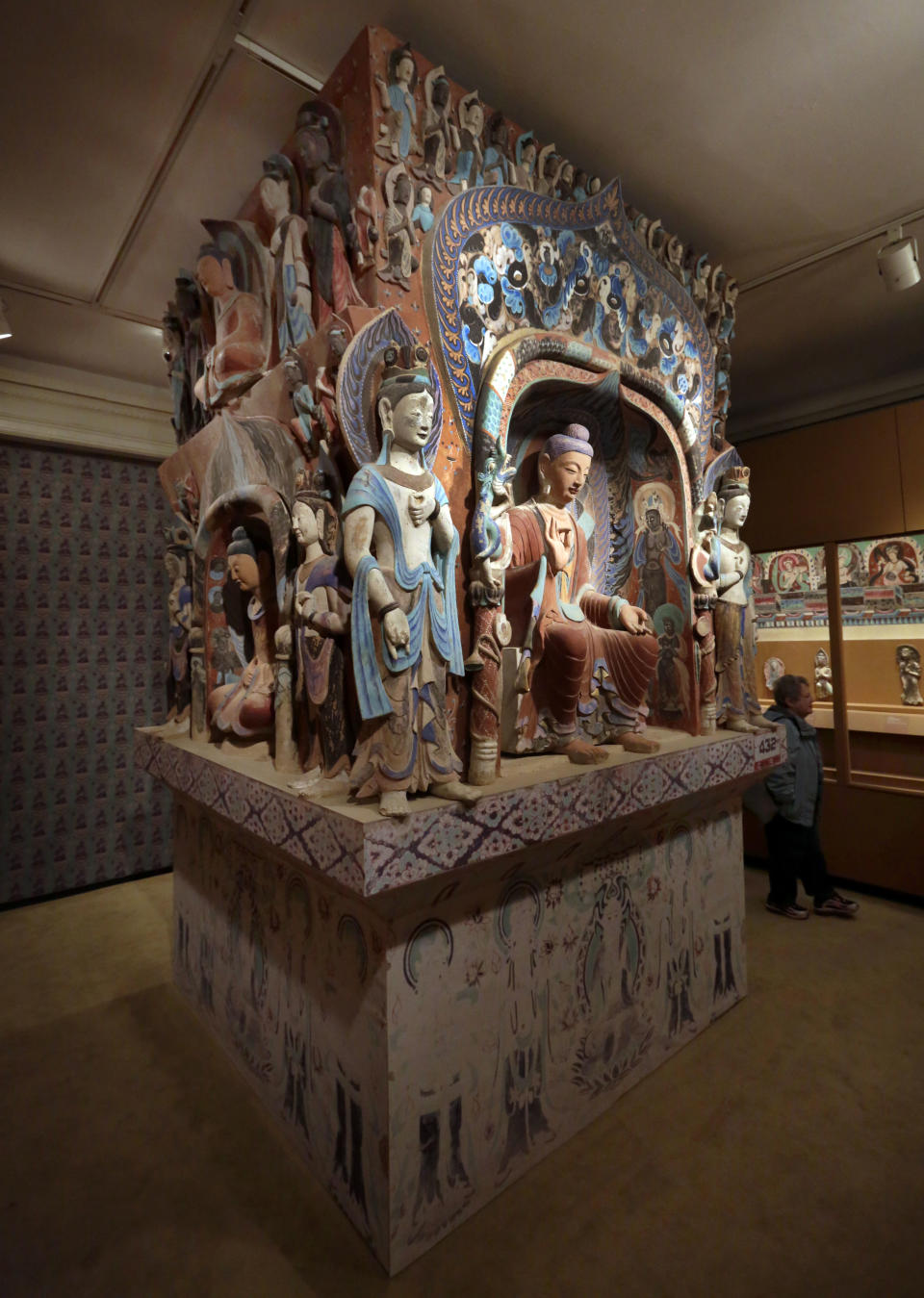 The central pillar of Mogao Cave 432, from the Western Wei Dynasty, 535-556 AD, is presented in "Dunhuang: Buddhist Art at the Gateway of the Silk Road," at the China Institute, in New York, Tuesday, April 24, 2013. (AP Photo/Richard Drew)