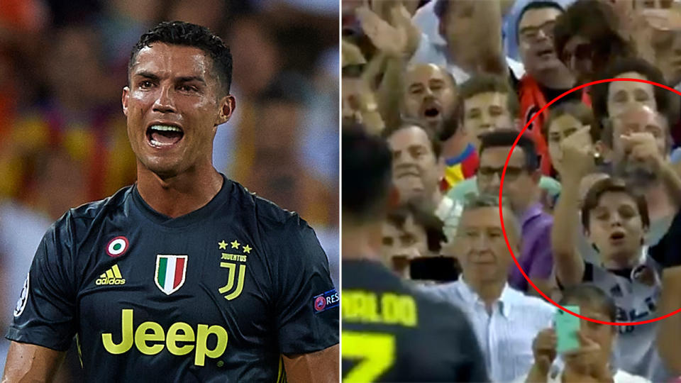 A young Valencia fan’s brutal gesture to a distraught Cristiano Ronaldo. Pic: Getty/Optus Sport