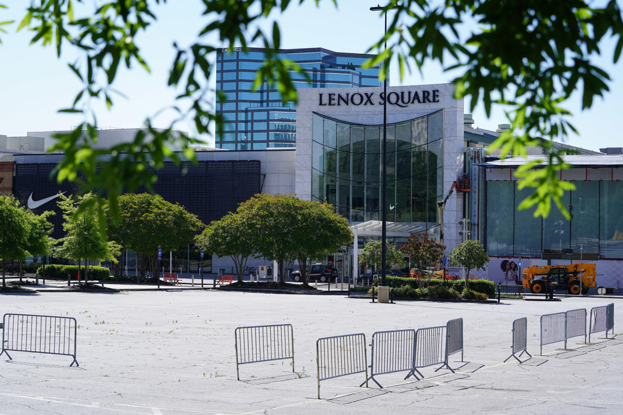 Security barricades stand outside the Lenox Square mall while it remains temporarily closed in Atlanta, Georgia, U.S., on Friday, May 1, 2020. (Elijah Nouvelage/Bloomberg via Getty Images)