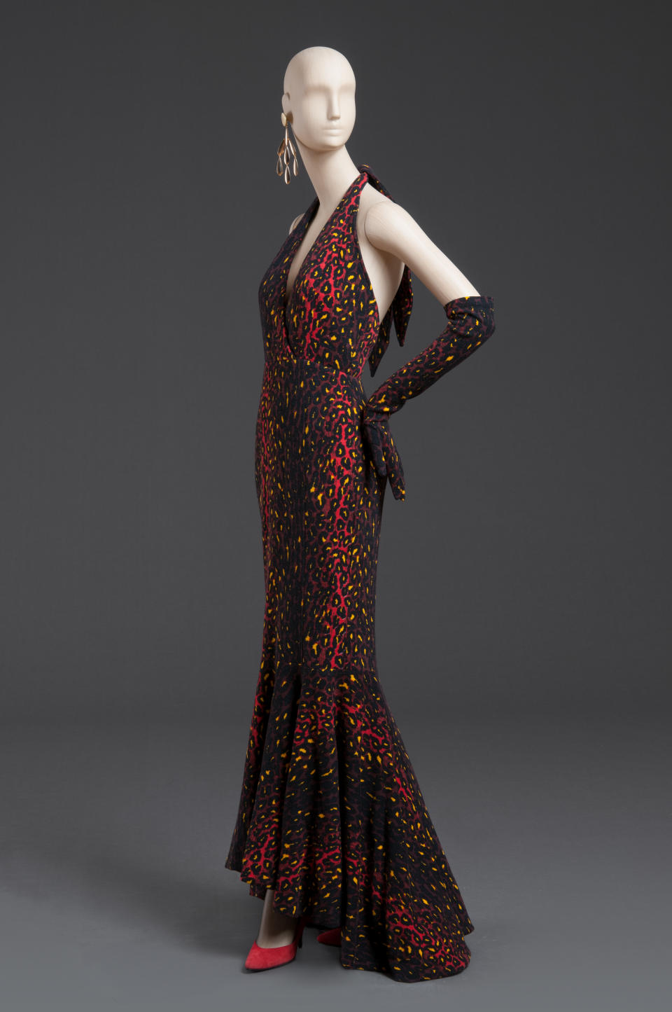 “Woman’s Dress and Gloves,” Mock Couture Collection, fall 1987–88, by Patrick Kelly, American (active Paris), 1954–1990. Red, burgundy, yellow, and black leopard print wool and nylon knit, center back length (Dress): 51 inches; gloves: 22 × 5 inches. Gift of Bjorn Guil Amelan and Bill T. Jones in honor of Monica Brown, 2015. - Credit: Courtesy of Philadelphia Museum of Art, 2021