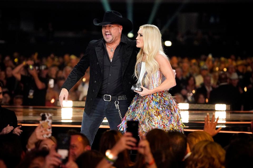 Jason Aldean and Carrie Underwood accept the award for Single of the Year during the 57th Academy of Country Music Awards at Allegiant Stadium in Las Vegas, Nev., Monday, March 7, 2022.