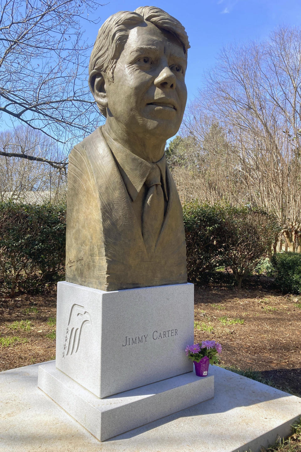 Flowers are shown on the grounds of the Carter Center in Atlanta, Sunday, Feb. 19, 2023. Well-wishes and fond remembrances for former President Jimmy Carter were pouring in a day after he entered hospice care at his home in Georgia. (AP Photo/Jeff Martin)