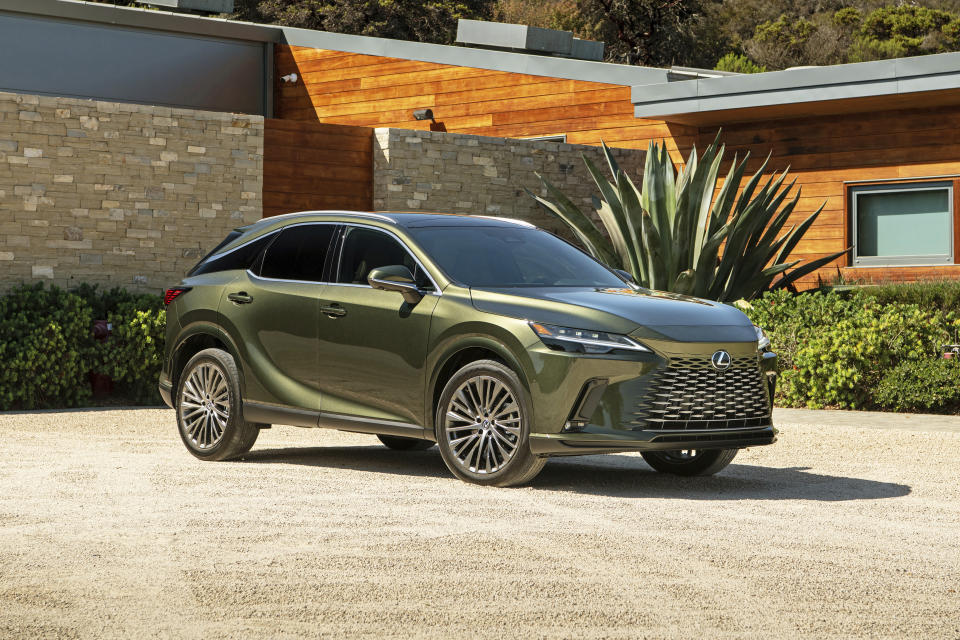 This photo provided by Lexus shows the 2023 RX 350h. The RX 350h is the hybrid version of the RX midsize SUV. It gets an EPA-estimated 36 mpg to go along with its smooth ride and luxurious cabin. (Courtesy of Lexus/Toyota Motor Sales U.S.A. via AP)