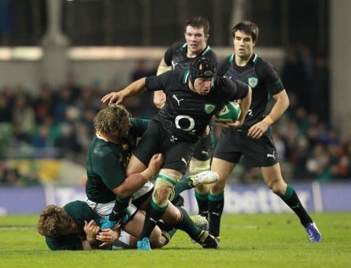 Ireland's hooker Richardt Strauss (2nd R) evades a tackle from South Africa's prop Jannie du Plessis (2nd L) during their Autumn International rugby union match at the Aviva stadium in Dublin. South Africa overturned a first half deficit and ill-discipline to open their November tour of the northern hemisphere with a deserved 16-12 victory