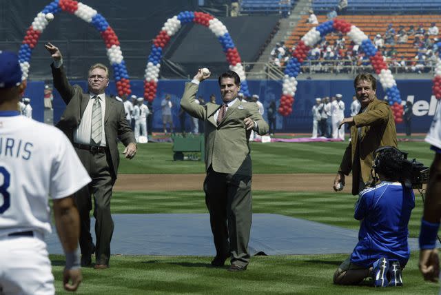 Stephen Dunn / Getty Images Sport From left to right: Former Dodgers Bill Russell, Steve Garvey and Ron Cey throw out the first pitch at Dodger Stadium.