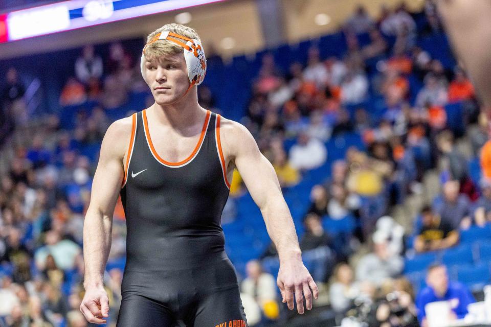 Oklahoma State wrestler Dustin Plott prepares for a match at the Big 12 Championships in Tulsa on March 4, 2023.