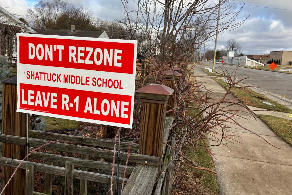 A yard sign on Elm Street protests the rezoning of Shattuck Middle School in Neenah as a Traditional Neighborhood Development District. The Common Council rejected the rezoning in December.