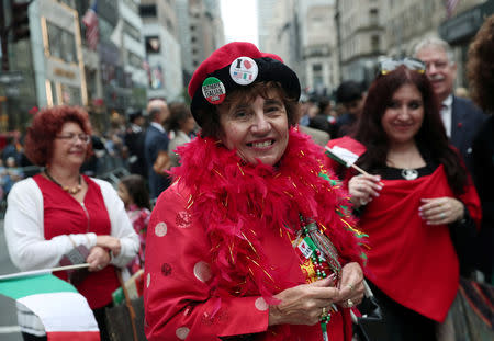 A woman stands during the 74th annual Columbus Day Parade in Manhattan, New York, U.S., October 8, 2018. Reuters/Shannon Stapleton