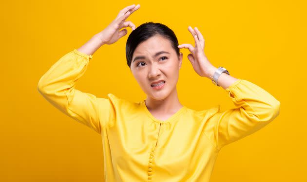 Want to beat dandruff this season? Start treating it before it even starts. (Photo: Teeramet Thanomkiat / EyeEm via Getty Images)