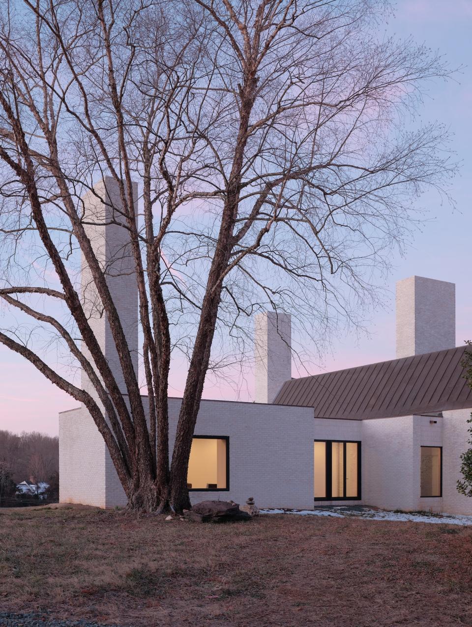 This Modern Home in an Idyllic Setting Is Defined by Three Bold Chimneys