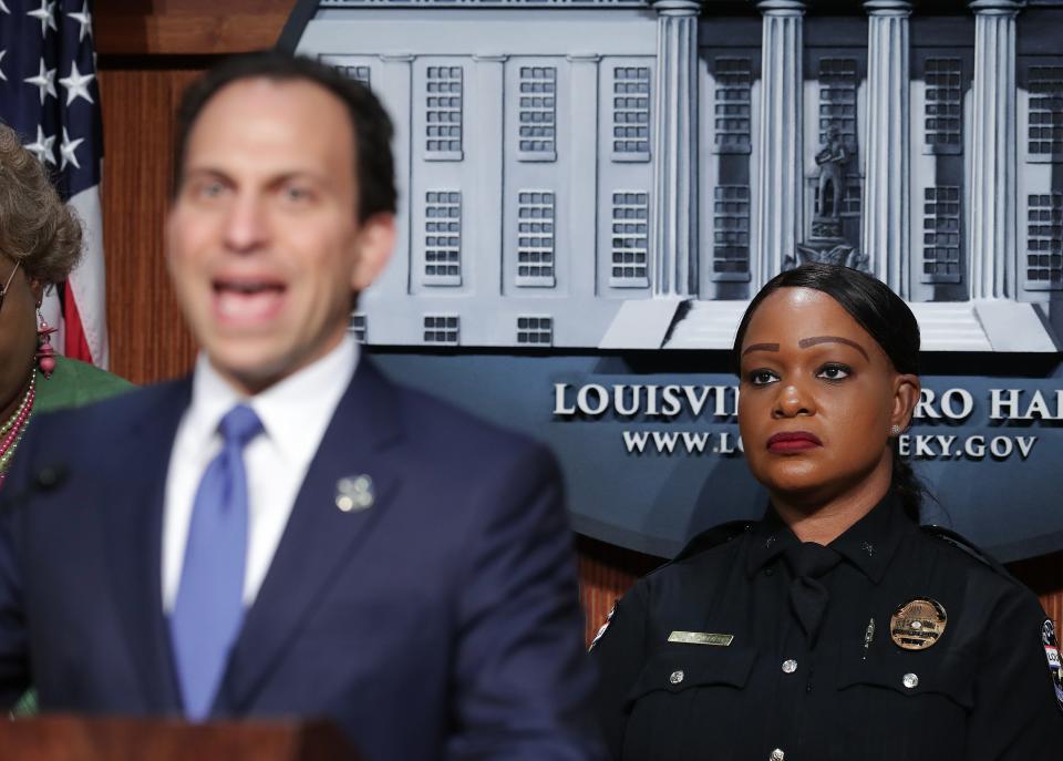 Interim Louisville Police Chief Jacquelyn Gwinn-Villaroel, right, looked on as Mayor Craig Greenberg announced that she has been selected as the permanent chief of the LMPD following a nationwide search in Louisville, Ky. on July 20, 2023.