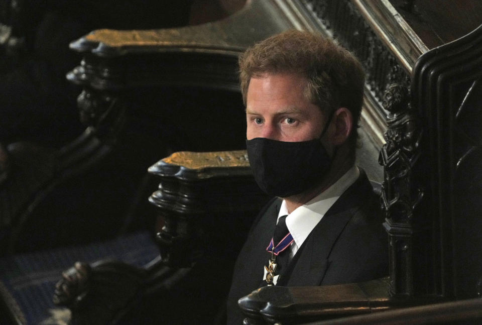 Prince Harry sits alone at St. George’s Chapel during the funeral for Prince Philip