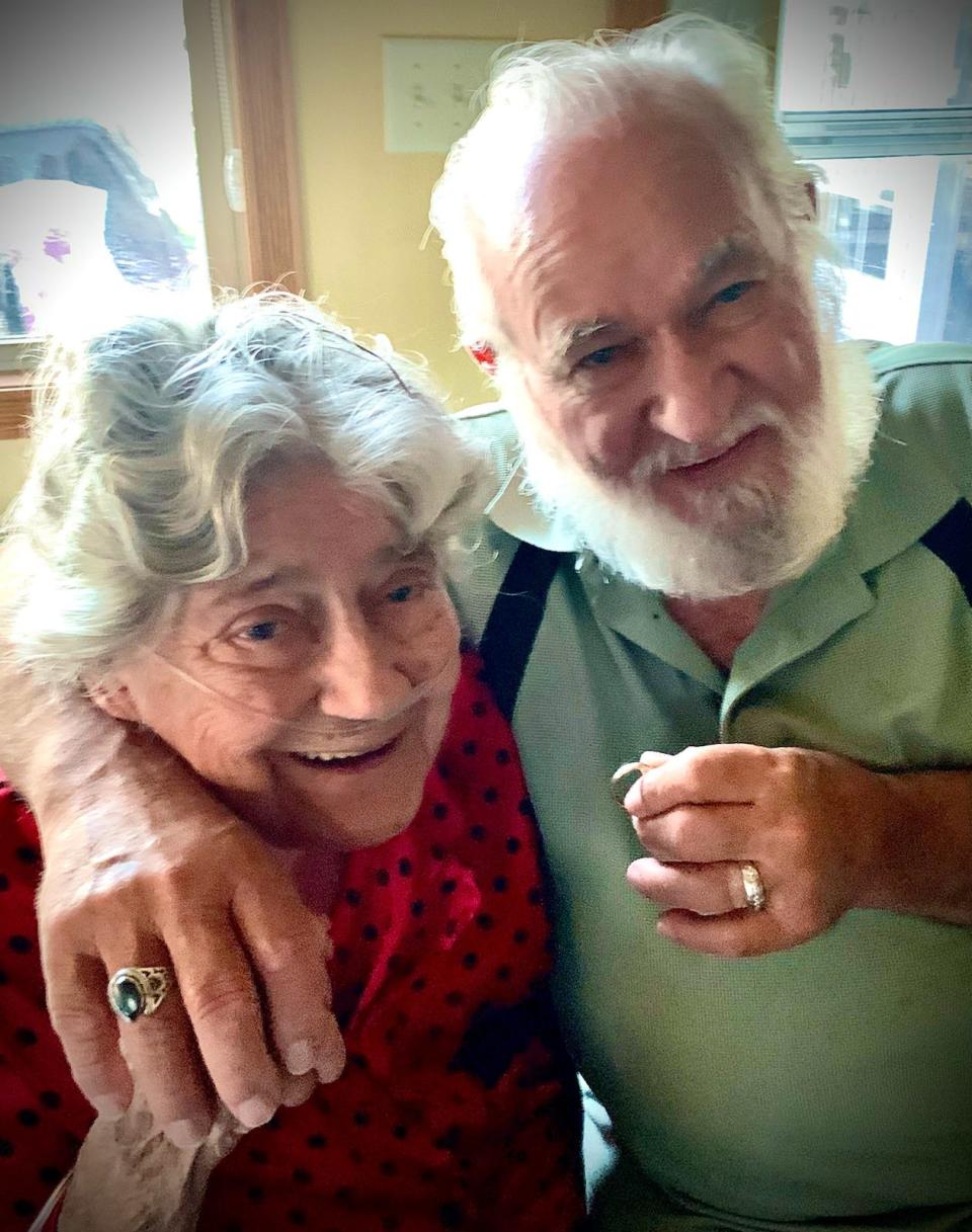 Judith and Dewey Sherman pose with his wedding ring, which had been lost for two years.