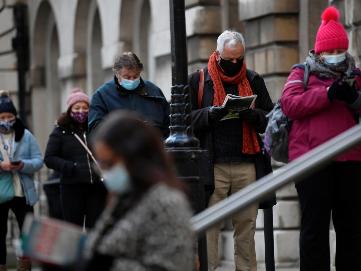 People queued for vaccines in London as Boris Johnson said ministers were trying to roll it out as quickly as possible (REUTERS)