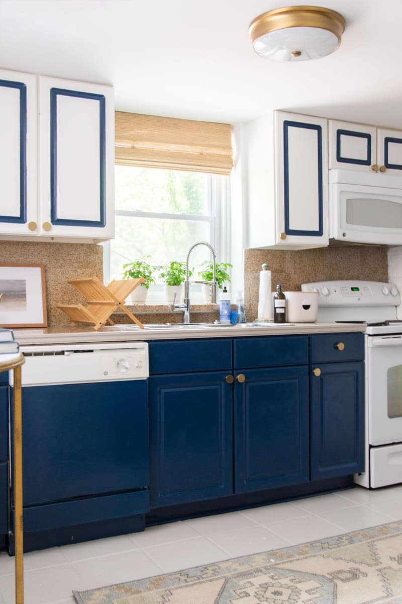 kitchen white walls cabinets with blue trim