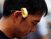 <p>A man with a yellow origami umbrella, symbol of the Occupy Central civil disobedience movement, takes part in the second anniversary of the movement outside government headquarters in Hong Kong, China Sept. 28, 2016. (Photo: Bobby Yip/Reuters) </p>