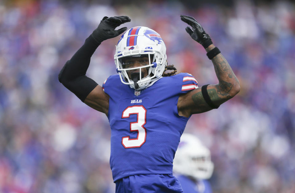 FILE - Buffalo Bills safety Damar Hamlin reacts after a play during the first half of the team's NFL football game against the Pittsburgh Steelers on Oct. 9, 2022, in Orchard Park, Hamlin has been cleared to resume playing and is attending the team’s voluntary workout program some four months after going into cardiac arrest and having to be resuscitated on the field during a game at Cincinnati, general manager Brandon Beane said Tuesday, April 18, 2023. (AP Photo/Joshua Bessex, File)