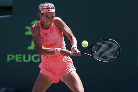 Mar 29, 2018; Key Biscayne, FL, USA; Victoria Azarenka of Belarus hits a backhand against Sloane Stephens of the United States (not pictured) in a women's singles semi-final of the Miami Open at Tennis Center at Crandon Park. Mandatory Credit: Geoff Burke-USA TODAY Sports