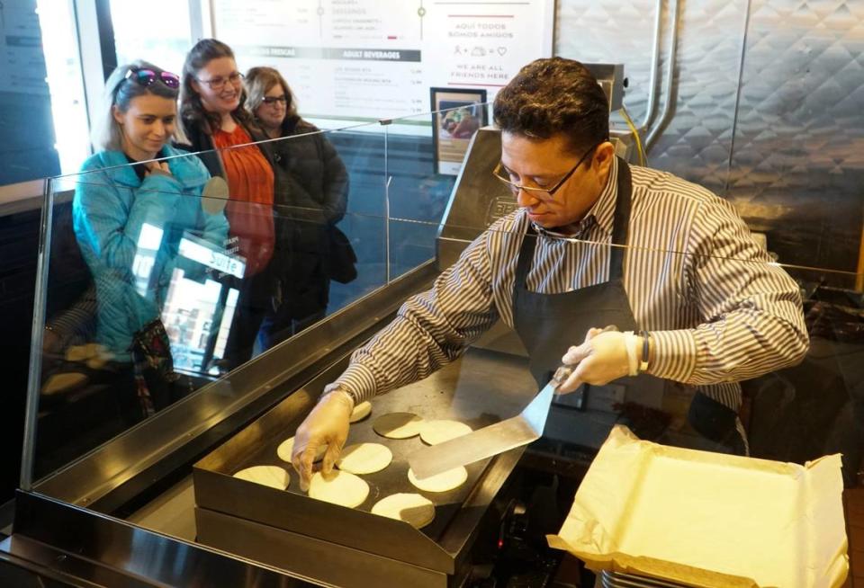 Mario Quiroz is pictured making fresh tortillas at Molino’s Taqueria in 2019.