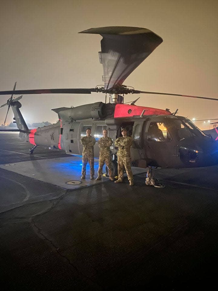 Members of the CH-47 Chinook helicopter crew from Stockton that took part in recent dramatic rescues of those trapped by wildfires: CW5 Joseph Rosamond; CW2 Brady Hlebain; Sgt. George Esquivel; and Sgt. Cameron Powell.