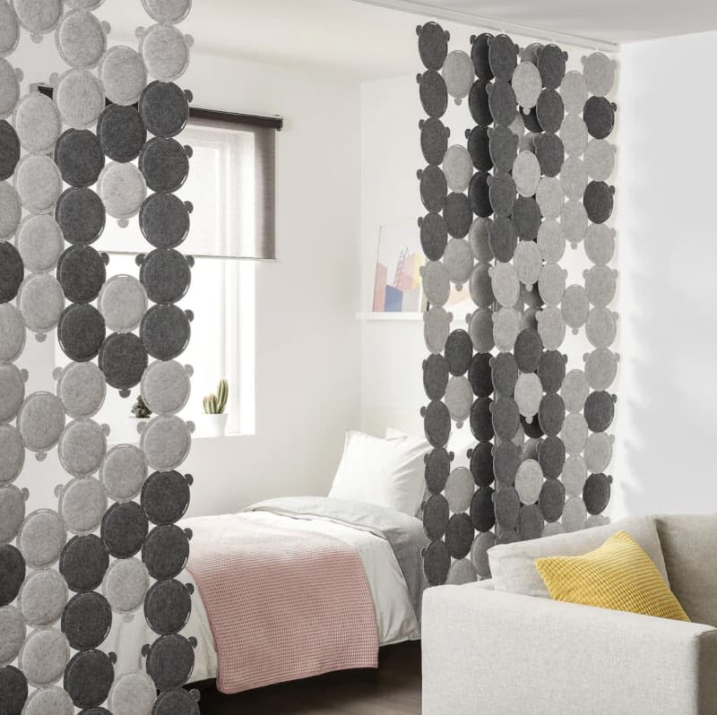 IKEA's ODDLAUG Sound absorbing panel in gray used as a room divider