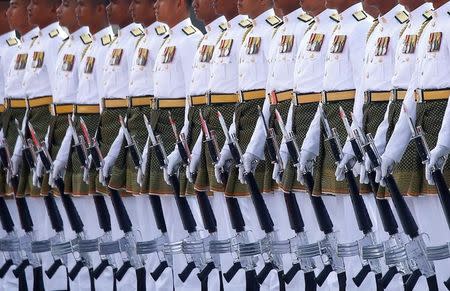 An honour guard waits for the arrival of Saudi Arabia's King Salman at the Parliament House in Kuala Lumpur, Malaysia February 26, 2017. REUTERS/Edgar Su