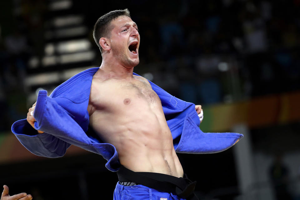 <p>Czech Republic’s Lukas Krpalek celebrates after winning the gold medal during the men’s 100-kg judo competition at the 2016 Summer Olympics in Rio de Janeiro, Brazil, Thursday, Aug. 11, 2016. (AP Photo/Markus Schreiber) </p>