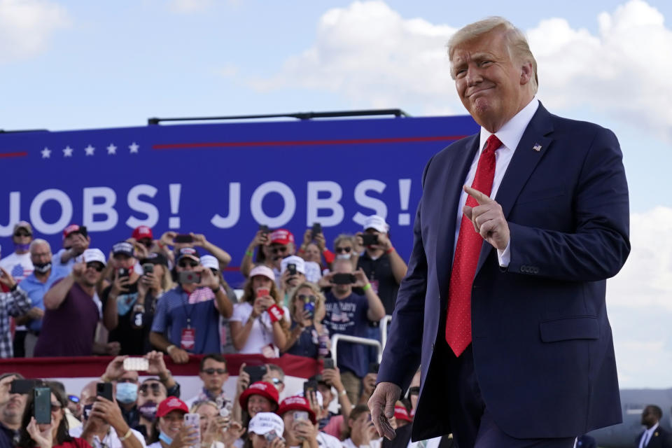 President Donald Trump arrives to speak at a campaign rally at Wittman Airport, Monday, Aug. 17, 2020, in Oshkosh, Wis. (AP Photo/Evan Vucci)