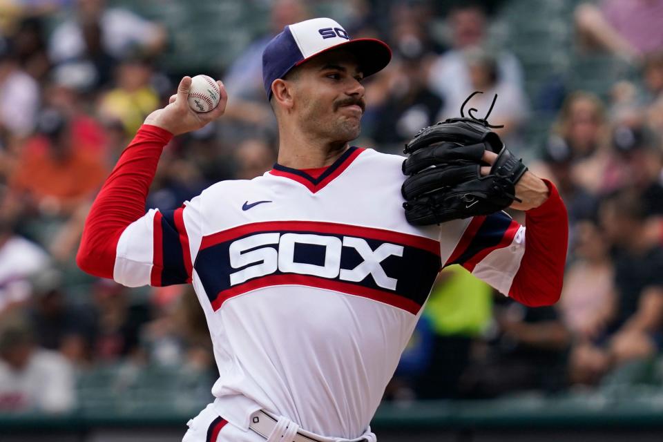 Chicago White Sox starting pitcher Dylan Cease throws against the Cleveland Guardians during the first inning of a baseball game in Chicago, Sunday, July 24, 2022. (AP Photo/Nam Y. Huh)